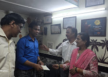 Happy clients receiving property handover from One Stop Property Solutions